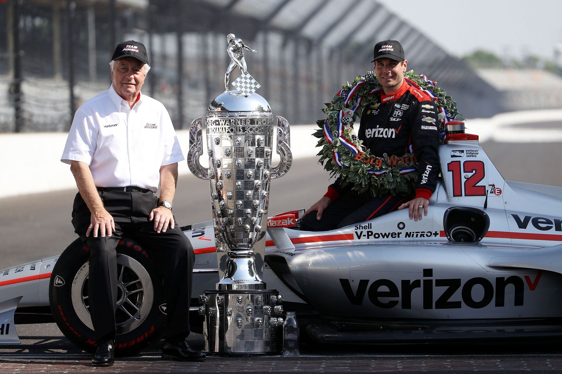 Roger Penske (L) and Will Power (R) at the 102nd Running of the Indianapolis 500 - Source: Getty